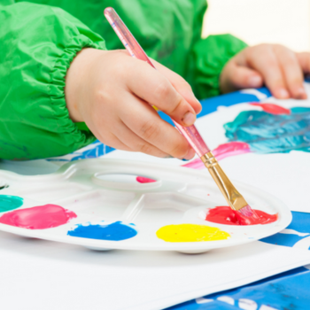 close-up of child painting